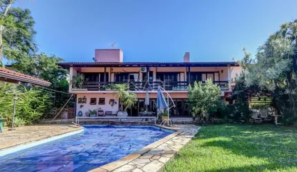 Casa em condomínio fechado com 3 quartos à venda na Avenida da Cavalhada, 5205, Cavalhada, Porto Alegre por R$ 2.700.000