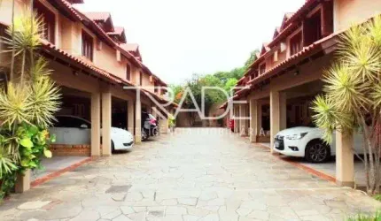 Casa em condomínio fechado com 3 quartos à venda na Rua Doutor Possidônio Cunha, 273, Vila Assunção, Porto Alegre por R$ 720.000