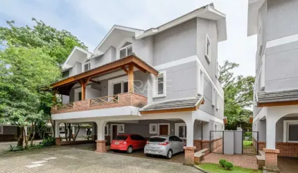 Casa em condomínio fechado com 3 quartos à venda na Rua General Rondon, 59, Tristeza, Porto Alegre por R$ 1.950.000