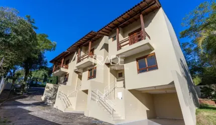 Casa em condomínio fechado com 3 quartos à venda na Avenida Vicente Monteggia, 1669, Cavalhada, Porto Alegre por R$ 495.000