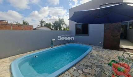 IMÓVEL EM ALVENARIA, COM PISCINA E CHURRASQUEIRA NO BALN. CAMBIJU, MEDINDO APROX. 75,00M², TERRENO DE 180,00M², CONTENDO 03 QUARTOS (01 SUÍTE) .