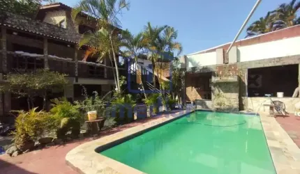 Casa com 6 quartos à venda na Avenida Ariovaldo Reis, Jardim Guaiuba, Guarujá, 531 m2 por R$ 1.280.000