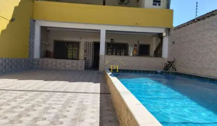 Casa com 2 dormitórios à venda, 120 m² por R$ 760.000 - Caiçara - Praia Grande/SP