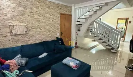 Sobrado com 3 dormitórios à venda, 143 m² por R$ 720.000,00 - Canto do Forte - Praia Grande/SP