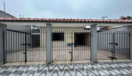 Casa com 3 dormitórios à venda, 100 m² por R$ 580.000 - Maracanã - Praia Grande/SP