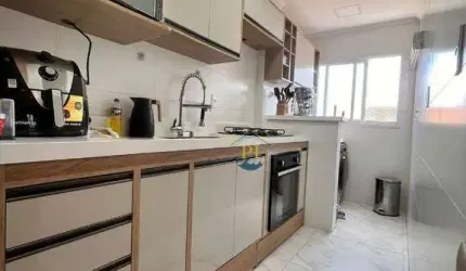 Apartamento com 2 dormitórios à venda, 52 m² por R$ 440.000 - Caiçara - Praia Grande/SP