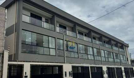 Casa com 2 dormitórios à venda, 89 m² por R$ 469.000 - Maracanã - Praia Grande/SP