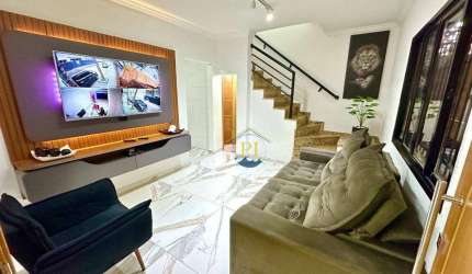 Casa com 3 dormitórios à venda, 101 m² por R$ 870.000,00 - Guilhermina - Praia Grande/SP
