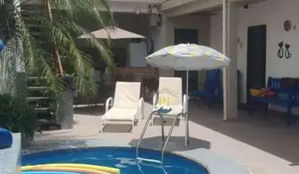Pousada com 7 dormitórios à venda, 248 m² por R$ 1.200.000,00 - Jardim Trevo - Praia Grande/SP