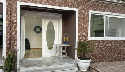 Casa com 4 dormitórios à venda, 130 m² por R$ 1.500.000,00 - Canto do Forte - Praia Grande/SP