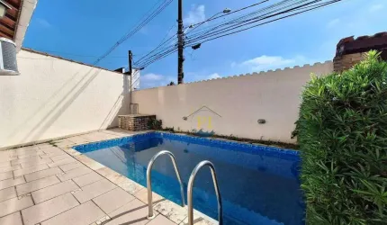Casa com 2 dormitórios à venda, 100 m² por R$ 550.000,00 - Caiçara - Praia Grande/SP