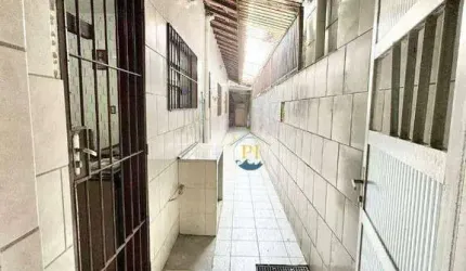 Casa com 2 dormitórios à venda, 70 m² por R$ 380.000 - Caiçara - Praia Grande/SP