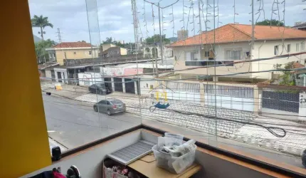 Sobrado com 3 dormitórios à venda, 156 m² por R$ 900.000 - Tude Bastos (Sítio do Campo) - Praia Grande/SP