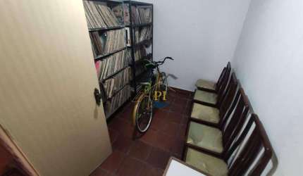 Casa com 3 dormitórios à venda, 130 m² por R$ 250.000 - Cidade da Criança - Praia Grande/SP