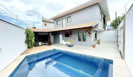 Sobrado com 3 dormitórios à venda, 160 m² por R$ 1.330.000 - Caiçara - Praia Grande/SP