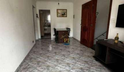 Apartamento com 2 dormitórios à venda, 62 m² por R$ 399.000,00 - Tupi - Praia Grande/SP
