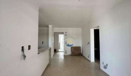 Apartamento com 2 dormitórios à venda, 67 m² por R$ 700.000 - Canto do Forte - Praia Grande/SP