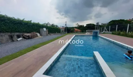Casa com 4 dormitórios à venda, 280 m² por R$ 850.000,00 - Condomínio Residencial Urbanova - Guararema/SP