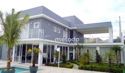 Casa com 5 dormitórios à venda, 480 m² por R$ 1.890.000 - Condomínio Lago Dourado - Jacareí - SP