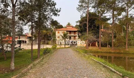 Casa com 4 dormitórios à venda, 274 m² por R$ 1.780.000,00 - Condomínio Residencial Alpes de Guararema - Guararema/SP