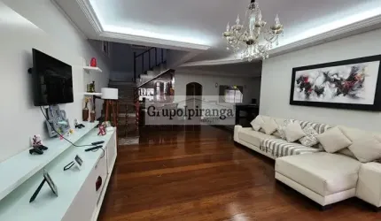 Casa com Churrasqueira e Edícula, 5 quartos, sendo que 3 são suítes e Garagem para até 4 carros