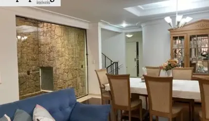 Sobrado 3 pavimentos, varanda gourmet com churrasqueira, 4 dormitórios sendo 3 suítes e 6 vagas de garagem.