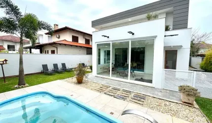 CASA 4 DORMITÓRIOS EM JURERE INTERNACIONAL
