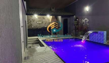 Casa Sobreposta térrea em Praia Grande, bairro Maracanã, 2 dormitórios e demais dependências, 1 vaga, Condomínio fechado, lazer com piscinas e churrasqueira.