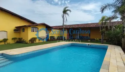 CASA PÉ NA AREIA COM TERRENO DE 910M²! 4 QUARTOS + EDÍCULA ITANHAÉM/SP