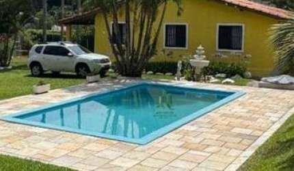 Casa com 4 dormitórios à venda, 215 m² por R$ 990.000,00 - Caputera - Arujá/SP
