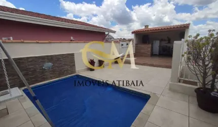 Casa com piscina em  Atibaia, localizada no Bairro Alvinópolis.