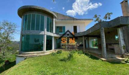 Sobrado com 5 dormitórios à venda, 345 m² por R$ 1.300.000,00 - Condomínio Reserva Ibirapitanga - Santa Isabel/SP