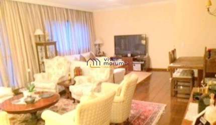 Amplo apartamento com 3 dormitórios em rua arborizada!