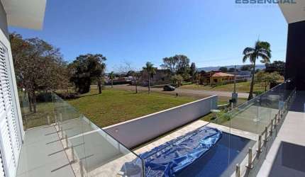Casa com 4 dormitórios à venda, 244 m² por R$ 1.490.000,00 - Condomínio Ninho Verde II - Pardinho/SP