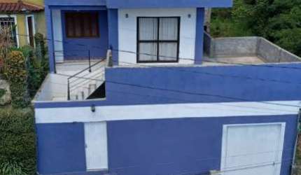 Casa em condomínio fechado com 3 quartos à venda na Avenida Vicente Monteggia, 1010, Cavalhada, Porto Alegre, 290 m2 por R$ 880.000