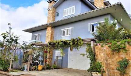 Casa em condomínio fechado com 4 quartos à venda na Rua Antonio Lory Müller, 140, Alto Petrópolis, Porto Alegre, 314 m2 por R$ 1.119.000