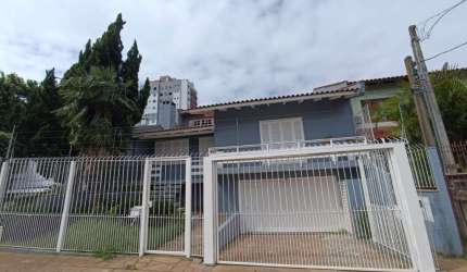 Casa com 3 quartos à venda na Rua Pompílio Gomes, 407, Dom Feliciano, Gravataí, 230 m2 por R$ 1.050.000