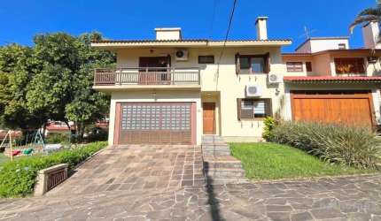 Casa com 3 quartos à venda na Praça São Caetano, 90, Teresópolis, Porto Alegre, 172 m2 por R$ 1.280.000