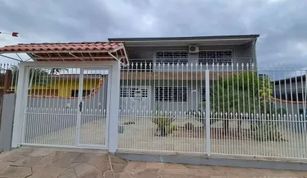 Casa com 3 quartos à venda na Rua Gaspar Martins, 894, Americana, Alvorada, 186 m2 por R$ 595.000