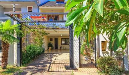 Casa com 4 quartos à venda na Rua Claudio da Silva Pinto, 287, Espírito Santo, Porto Alegre, 201 m2 por R$ 599.000