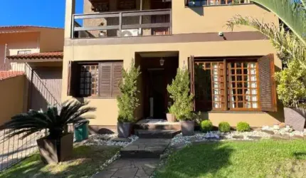 Casa com 4 quartos à venda na Rua Ari Peixoto Martins, 190, Espírito Santo, Porto Alegre, 262 m2 por R$ 765.000