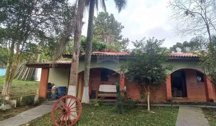 Chácara - área à venda com 04 dormitórios sendo 01 suíte em Suzano/SP.