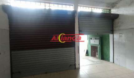 Oportunidade imperdível: Sobrado com 2 casas independentes + salão comercial!