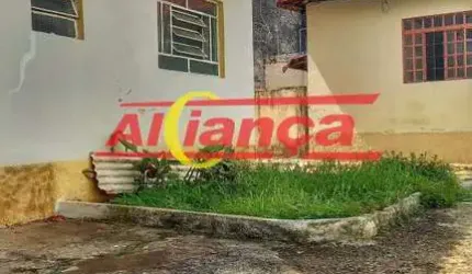 Casa com 2 casas no mesmo terreno antigas à venda na Ponte Grande