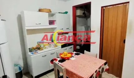 Investimento Garantido: Terreno com 3 Casas em Guarulhos!