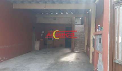 São duas casas com a garagem  bem grande!!!
