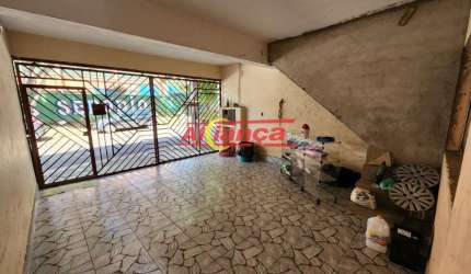 TERRENO COM DUAS CASAS.