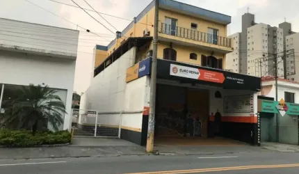 Prédio com 2 apartamentos e salão comercial, 902,18 m² - Av Emilio Ribas - GUARULHOS/SP