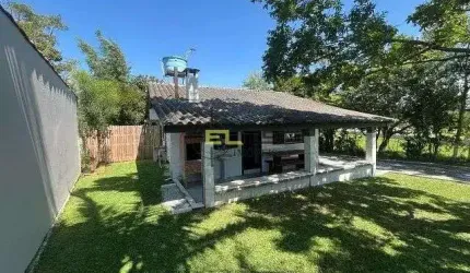 Casa à venda, porteira fechada de 3 dormitórios, perto das praias do Maciambu e praia do sonho, em