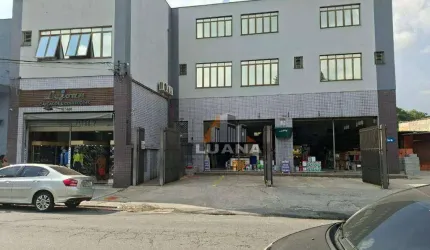 Predio com 2 Lojas e Deposito com 8 vagas de garagem em Rua Comercial defronte Agencia do Bradesco da Vila Jaguara.